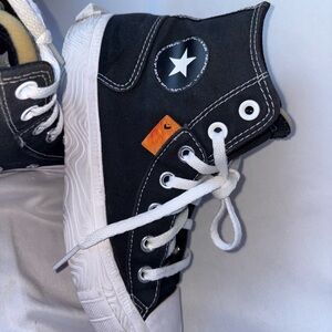This is a Converse Chuck Taylor Alt Star high-top sneaker